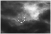 Sun and clouds, begining of annularity, eclipse of Oct 14, 2023. Great Basin National Park ( black and white)