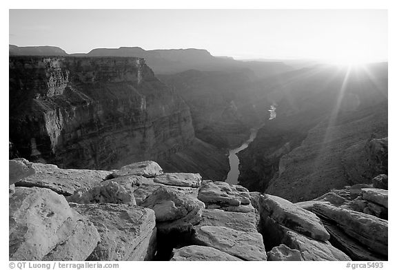 Cracked rocks and Colorado River at Toroweap, sunset. Grand Canyon National Park (black and white)