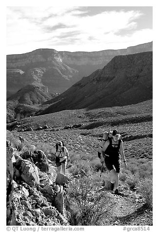Backpackers in Surprise Valley, Thunder River and Deer Creek trail. Grand Canyon National Park (black and white)