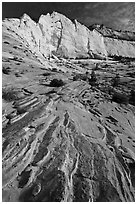 Sandstone swirls and cliff, Zion Plateau. Zion National Park, Utah, USA. (black and white)