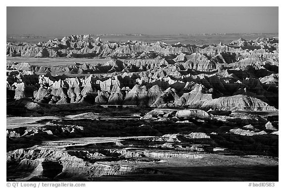 View over eroded ridges from Pinacles overlook, sunrise. Badlands National Park (black and white)
