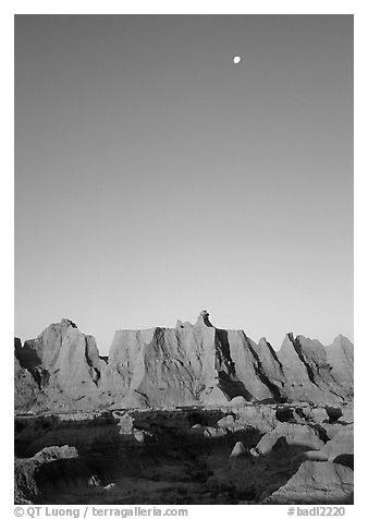 Moon and erosion formations, Cedar Pass, dawn. Badlands National Park (black and white)