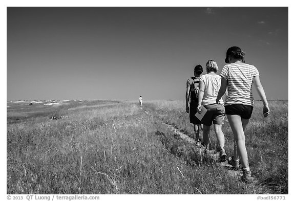 Hikers on Medicine Root Trail. Badlands National Park (black and white)