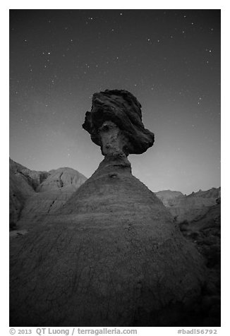 Pedestal rock at badlands at night. Badlands National Park, South Dakota, USA.