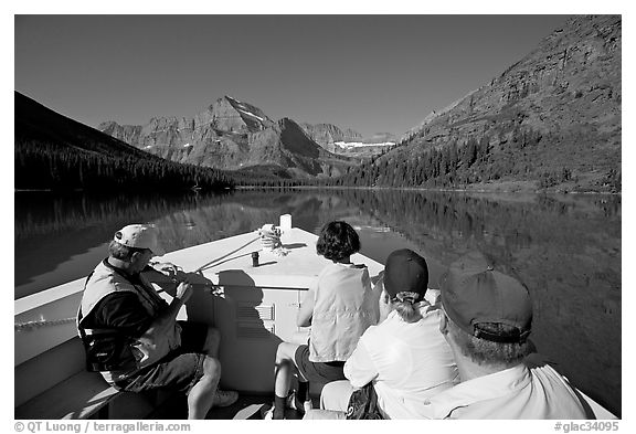 Riding the tour boat on Lake Josephine. Glacier National Park (black and white)