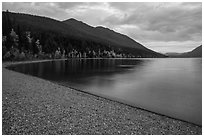 Gravel beach in autumn, Lake McDonald. Glacier National Park ( black and white)