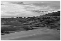 Dunes and sunset clouds. Great Sand Dunes National Park, Colorado, USA. (black and white)