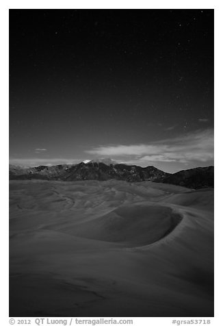 Dunes and Sangre de Cristo Mountains at night. Great Sand Dunes National Park, Colorado, USA.
