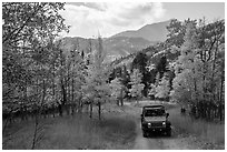 Jeep on Medano primitive road near Medano Pass in autumn. Great Sand Dunes National Park and Preserve ( black and white)