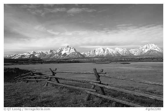 Fence, meadow, and Teton Range. Grand Teton National Park, Wyoming, USA.