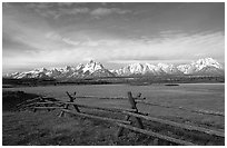 Fence, meadow, and Teton Range. Grand Teton National Park, Wyoming, USA. (black and white)