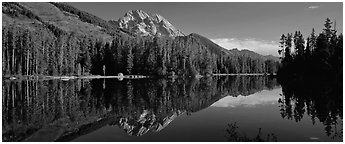 Mountain landscape with Lake reflection. Grand Teton National Park (Panoramic black and white)