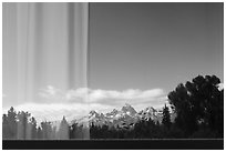 Teton Range, Craig Thomas Discovery and Visitor Center window reflexion. Grand Teton National Park ( black and white)