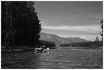 Kayakers approach narrow channel, Colter Bay. Grand Teton National Park ( black and white)
