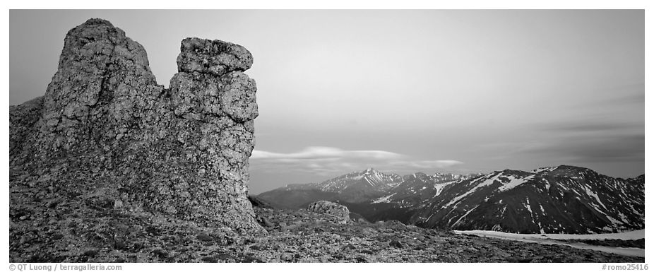 Rock towers on high pass and mountains at dusk. Rocky Mountain National Park (black and white)