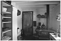 Kitchen of Roosevelt's Maltese Cross Cabin. Theodore Roosevelt National Park, North Dakota, USA. (black and white)