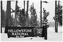 Park entrance sign in winter. Yellowstone National Park, Wyoming, USA. (black and white)