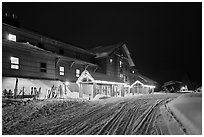 Old Faithful Snow Lodge at night, winter. Yellowstone National Park, Wyoming, USA. (black and white)