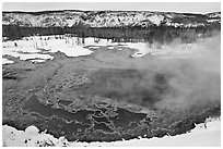 Gem pool seen from above, winter. Yellowstone National Park, Wyoming, USA. (black and white)