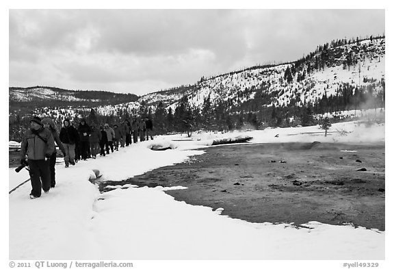 Large group of tourists in winter. Yellowstone National Park, Wyoming, USA.