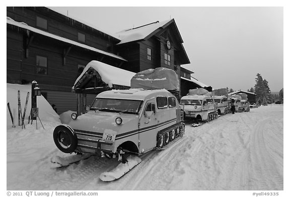 Snow busses in front of Old Faithful Snow Lodge. Yellowstone National Park (black and white)
