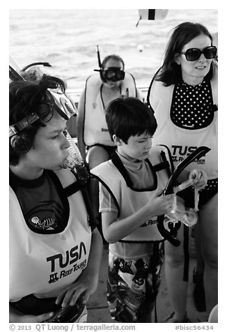 Family preparing for snorkeling. Biscayne National Park, Florida, USA.