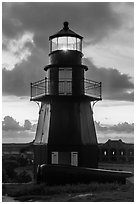 Harbor Light and gun at sunset. Dry Tortugas National Park, Florida, USA. (black and white)