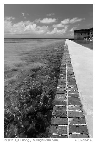 Seawall and coral reefs. Dry Tortugas National Park, Florida, USA.