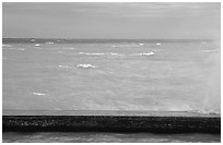Seawall battered by surf on a stormy day. Dry Tortugas National Park, Florida, USA. (black and white)