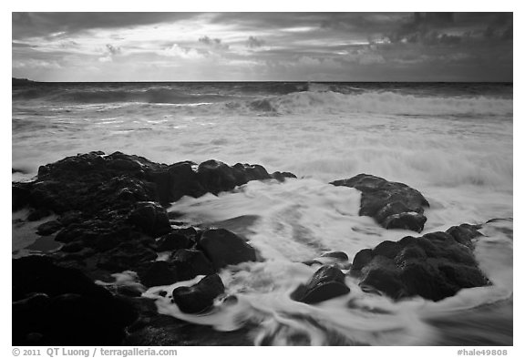 Waves breaking on volcanic rocks. Haleakala National Park (black and white)