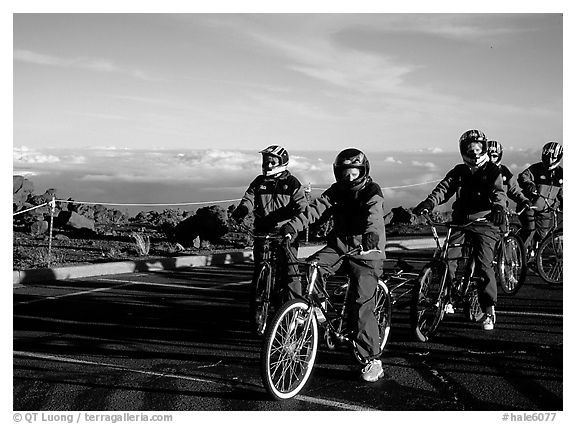 Getting ready to ride bicycles down from the top of the Crater to sea level. Haleakala National Park (black and white)