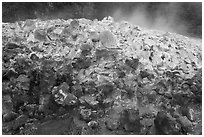 Mound of rocks covered with sulphur from vent. Hawaii Volcanoes National Park, Hawaii, USA. (black and white)