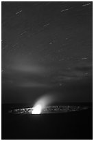 Glowing vent and star trails, Halemaumau crater. Hawaii Volcanoes National Park, Hawaii, USA. (black and white)