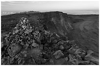 Summit cairn and crater at dusk. Hawaii Volcanoes National Park ( black and white)