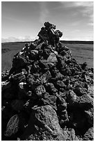 Mauna Loa summit cairn festoned with ritual offerings. Hawaii Volcanoes National Park, Hawaii, USA. (black and white)