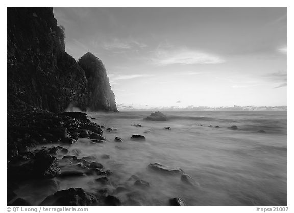 Foamy water and Pola Island at dawn, Tutuila Island. National Park of American Samoa (black and white)