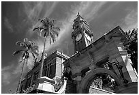 South Brisbane Town Hall, a red brick building with an ornate clock tower and archway. Brisbane, Queensland, Australia ( black and white)