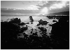 Rocks and surf at sunrise, Keanae Peninsula. Maui, Hawaii, USA (black and white)