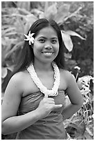 Tahitian woman making the traditional welcome gesture. Polynesian Cultural Center, Oahu island, Hawaii, USA (black and white)