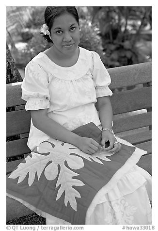 Woman making a traditional hawaiian quilt. Polynesian Cultural Center, Oahu island, Hawaii, USA (black and white)