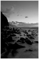 Boulders and misty surf from Kee Beach, dusk. Kauai island, Hawaii, USA (black and white)