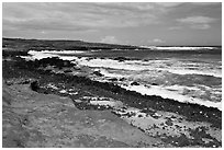 Colorful shale and ocean with surf, South Point. Big Island, Hawaii, USA (black and white)