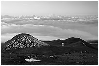 Antenna on volcano top above clouds. Mauna Kea, Big Island, Hawaii, USA ( black and white)