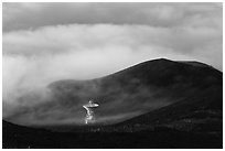 Radio telescope and clouds. Mauna Kea, Big Island, Hawaii, USA (black and white)
