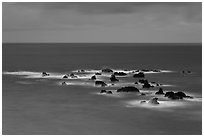 Offshore rocks in ocean. Maui, Hawaii, USA (black and white)