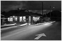 Restaurant and street by night, Lihue. Kauai island, Hawaii, USA (black and white)