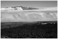 Mauna Loa Observatory, clouds, and Mauna Kea. Big Island, Hawaii, USA ( black and white)