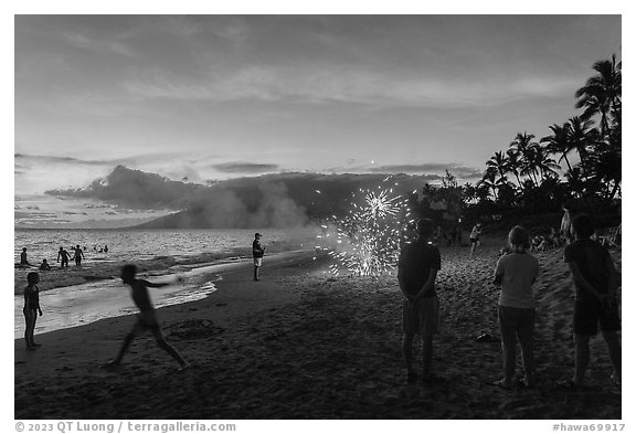 Forth of July fireworks on beach, Kihei. Maui, Hawaii, USA (black and white)