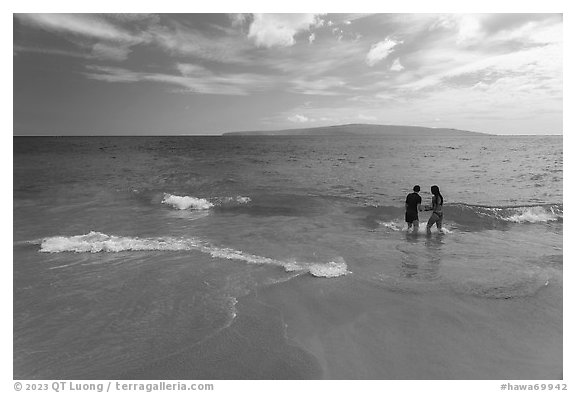Couple at Oneloa Beach. Maui, Hawaii, USA (black and white)