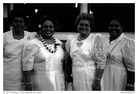 Sunday women churchgoers dressed in white, Pago Pago. Pago Pago, Tutuila, American Samoa (black and white)